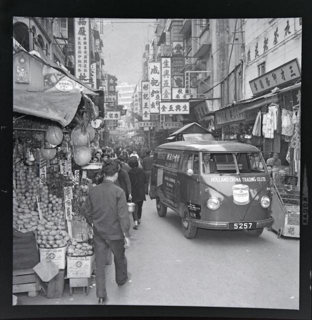 Holland-China Trading Company: VW T1 delivery van at street market, Hong Kong, ca. 1956