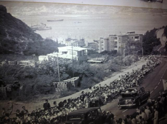 Procession lined by school children?