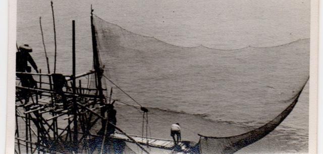 Fishermen and women at foot of Mount Davis