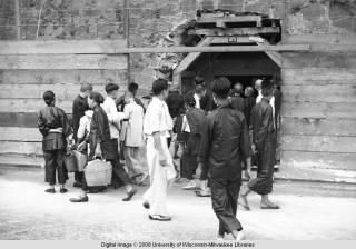 Hong Kong, people looking into an air raid shelter