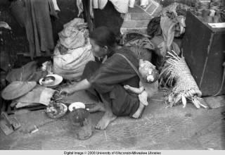 Hong Kong, woman with baby