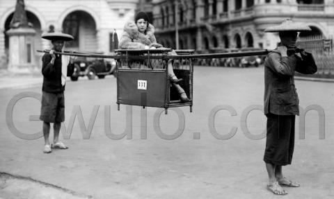 1920s Lady in sedan chair