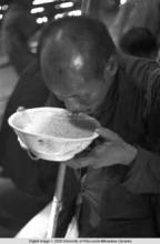 Hong Kong, man eating rice