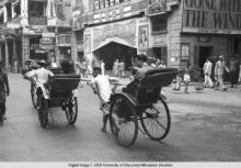 Hong Kong, rickshaws in front of the Queen's Theater