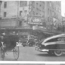 rickshaw and a nash car downtown hong kong jan[1]. 1951
