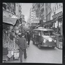 Holland-China Trading Company: VW T1 delivery van at street market, Hong Kong, ca. 1956