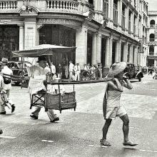 man carried in sedan, downtown Hong Kong - 1941