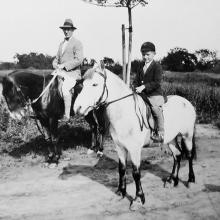 Philip Harding Klimanek and his son Reginald riding horses, Shanghai, ca. 1933