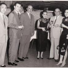 Maurice K Caudron with Italian textile representatives - 1957