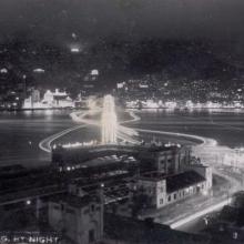 1953 Nighttime view of harbour from TST
