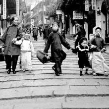 Chinese lady with children on corner of Pottinger Street
