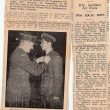 G C Randall receives wings (newspaper clippings)