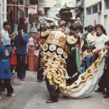 Lion Dance in the market streets, Chinese New Year