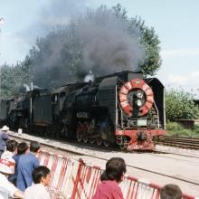 Chinese QJ Locomotive No. 1505 on Level Crossing