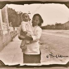 1948 Me with my baby amah whose name I know not.jpg