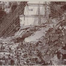 Workers clearing away the debris of the collapsed retaining wall and houses at Po Hing Fong in July 1925