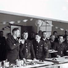 Officers serving meal b