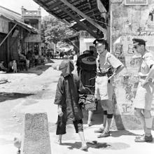 British officers standing at mainland China border marker in Shau Tau Kok