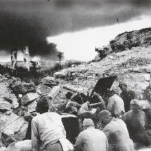 Japanese troops of the 10th Independent artillery brigade attack North Point. 1941