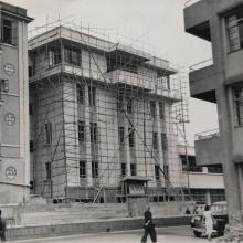 Four-story building under construction, designed by V. N. Dronnikoff