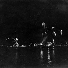 Fireworks over the harbour, celebrating the Japanese surrender.