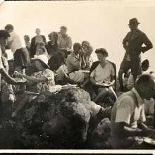 'Supper at Sunset Peak'. 24 August 1948. Includes Ann Crozier (centre right, cardigan on shoulders); Douglas Crozier (foreground right). Others unknown. Copyright Crozier family.