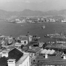 Over HMS Tamar to Kowloon.