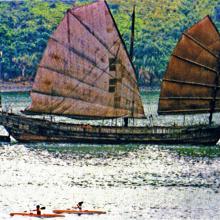 Sailing Junk between the old Castle Peak Road and Tsing Yi Island near Tuen 