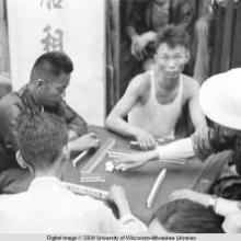 Hong Kong, group of men playing a game
