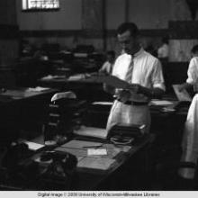 Hong Kong, men working in an office