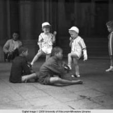 Hong Kong, children getting their shoes shined