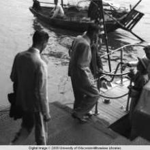 Hong Kong, American evacuees boarding boat with sailors during World War II