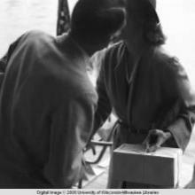 Hong Kong, American evacuees kissing during World War II