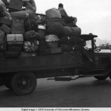Hong Kong, truck with luggage during American evacuation