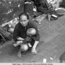 Hong Kong, woman with baby